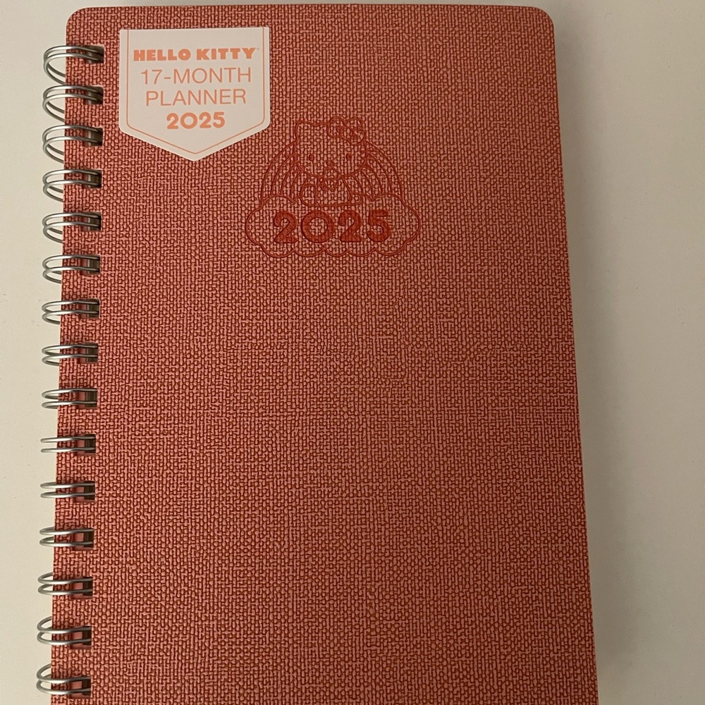 New pink Sanrio Hello Kitty planner. 2024-2025 17 month